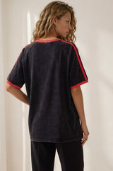 Model wearing Good Mother Tee in Black from Salty Crush