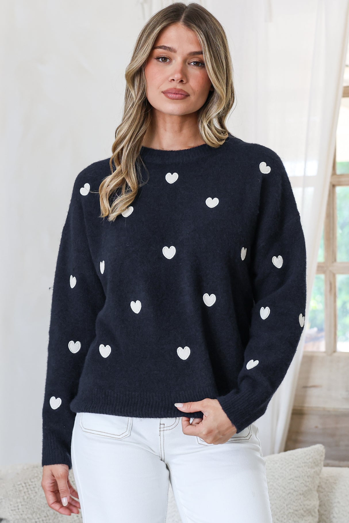 Model wearing Hartley Jumper in Navy from Salty Crush