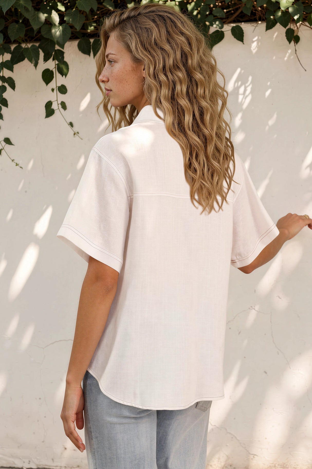 Model wearing Harvie Shirt in White from Salty Crush