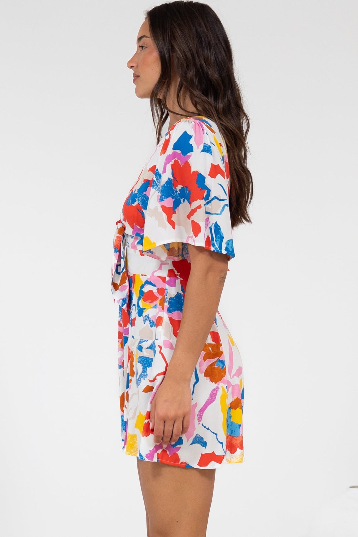 Hayleigh Playsuit - V-Neck Playsuit with Tie at Bust and Flutter Sleeves in Isadora Print
