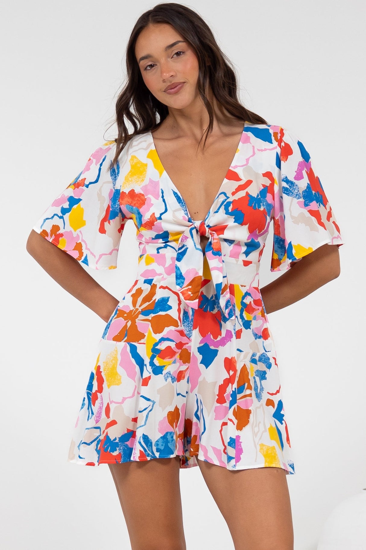 Hayleigh Playsuit - V-Neck Playsuit with Tie at Bust and Flutter Sleeves in Isadora Print