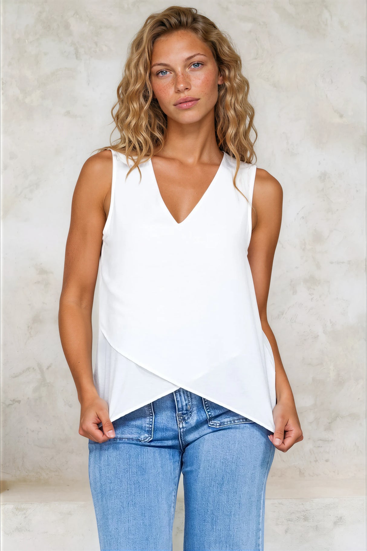 Hemingway Top - Asymmetrical Front High-Low V-Neck Sleeveless Top in White
