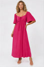Model wearing Henrietta Midi Dress in Hot Pink from Salty Crush