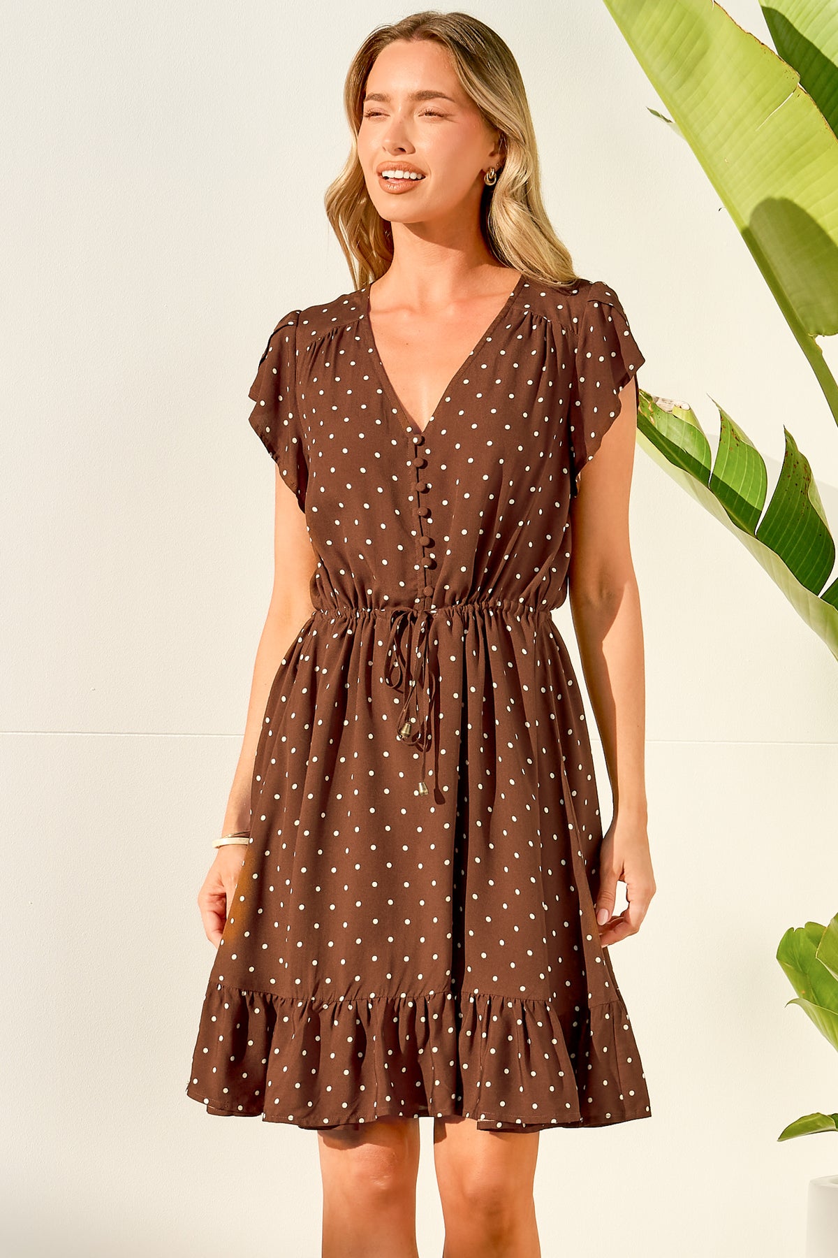 Hetta Mini Dress - V Neck Dress with Adjustable Tie Waist and Flutter Cap Sleeves in Mally Spot Print Brown