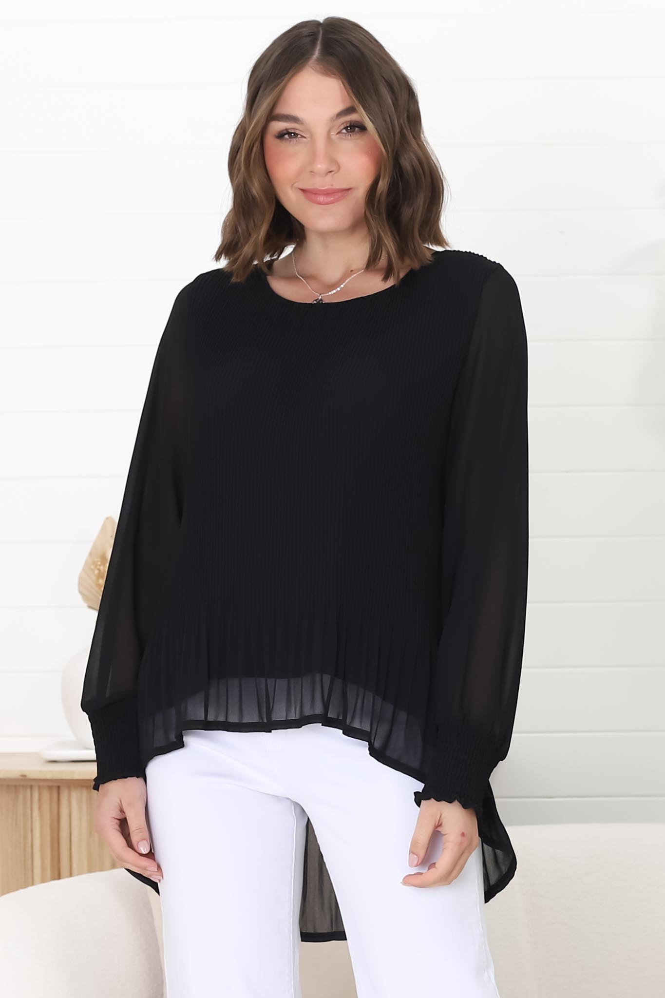 Kayt Blouse - Plisse Long Sleeve Top with High-Low Hemline in Black