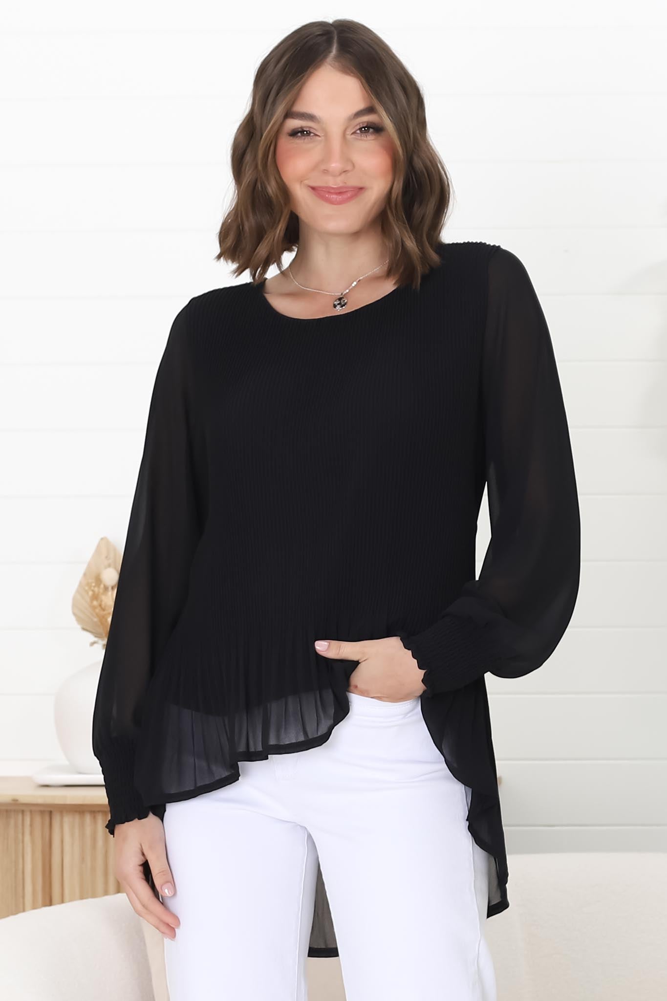 Kayt Blouse - Plisse Long Sleeve Top with High-Low Hemline in Black