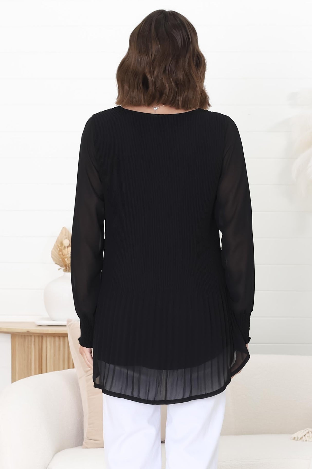 Kayt Blouse - Plisse Long Sleeve Top with High-Low Hemline in Black