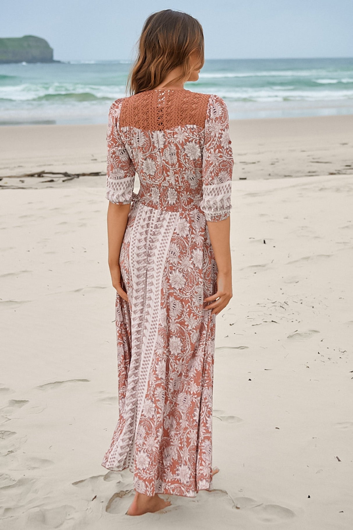 JAASE - Indiana Maxi Dress: Lace Back Shirred Waist A Line Dress with Handkerchief Hemline in Indah Print