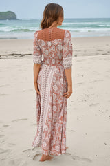 JAASE - Indiana Maxi Dress: Lace Back Shirred Waist A Line Dress with Handkerchief Hemline in Indah Print