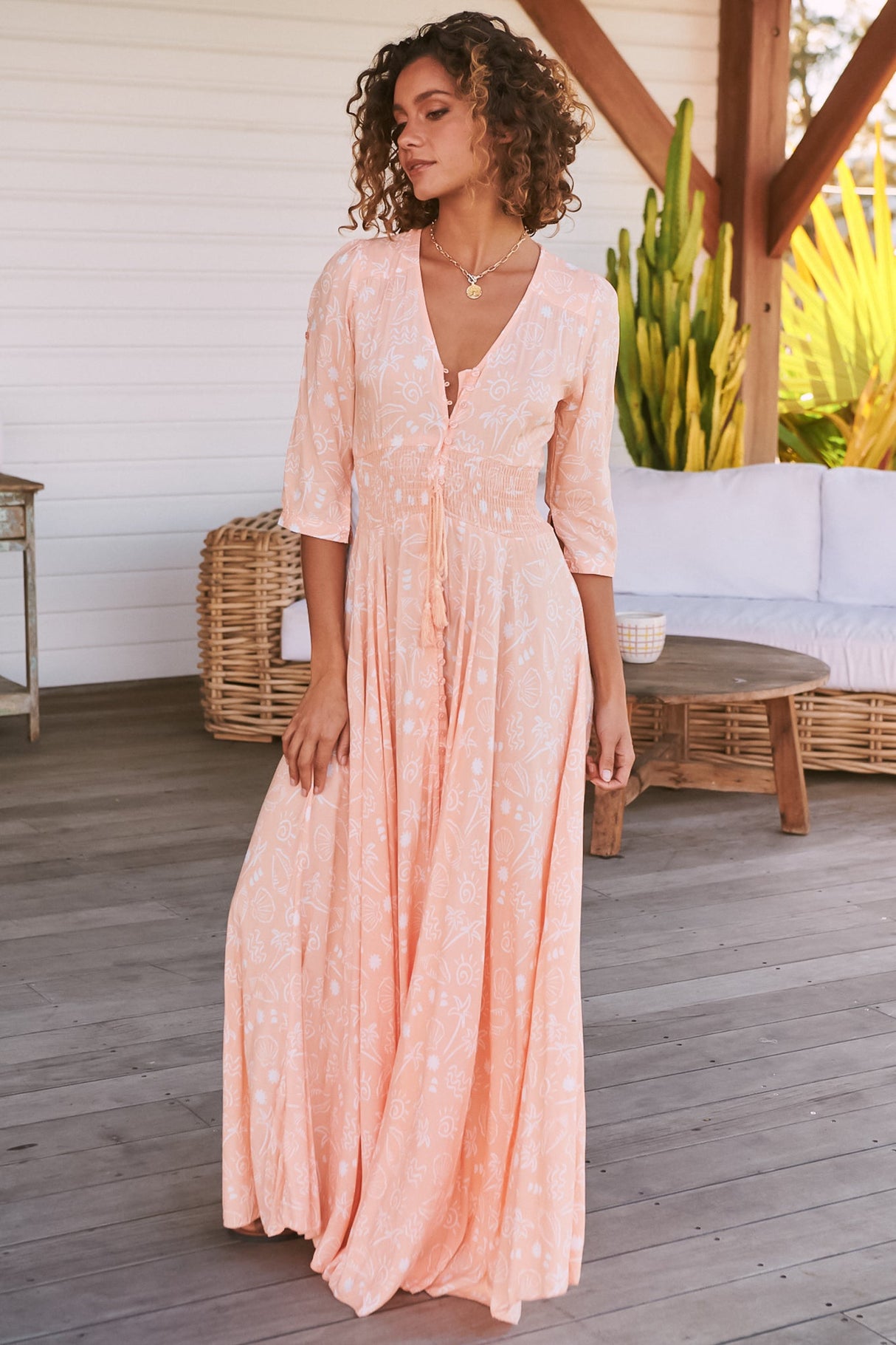 JAASE - Indiana Maxi Dress: Lace Back Shirred Waist A Line Dress with Handkercheif Hemline in Peach Island Print