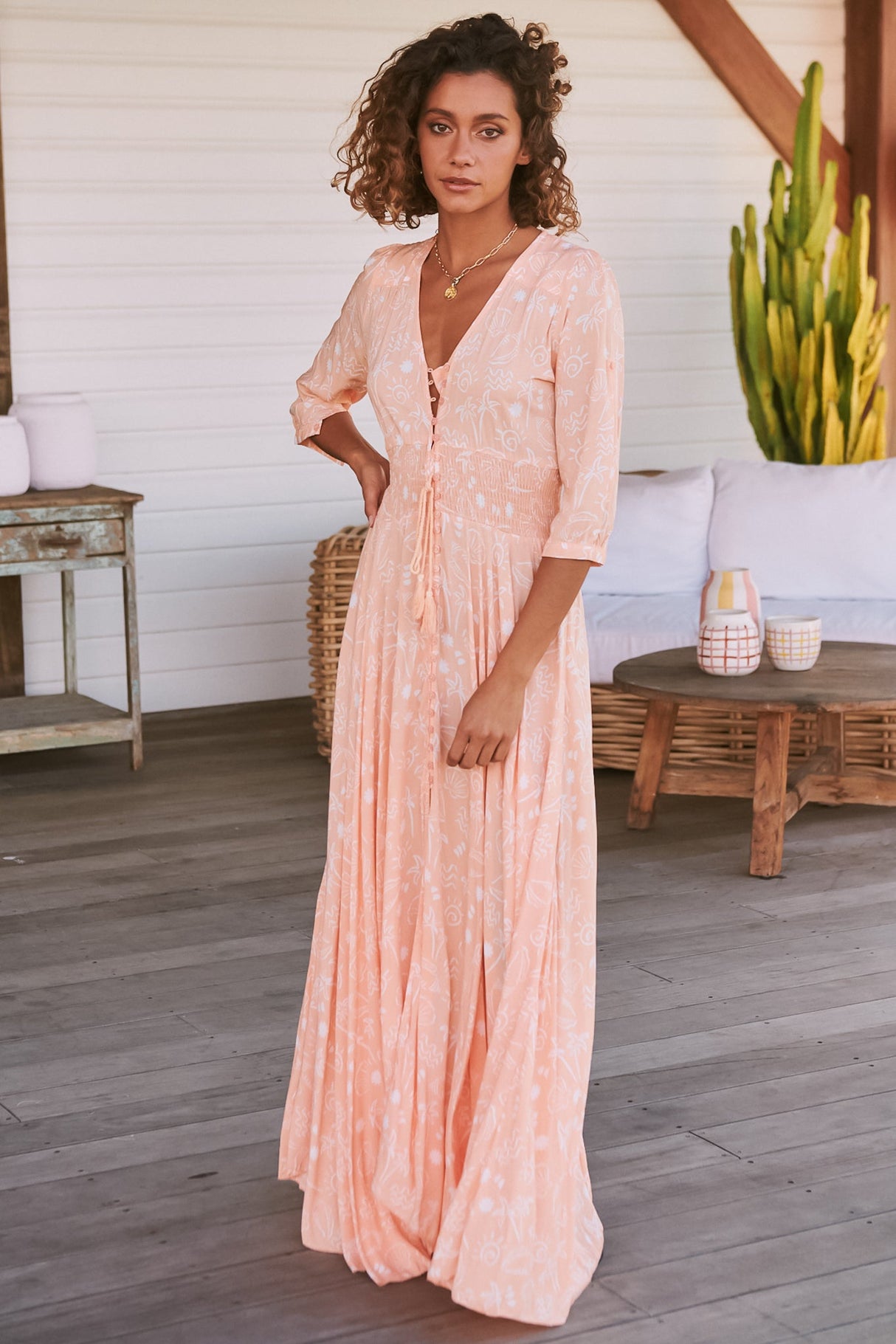 JAASE - Indiana Maxi Dress: Lace Back Shirred Waist A Line Dress with Handkercheif Hemline in Peach Island Print