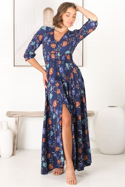 JAASE - Indiana Maxi Dress: Lace Back Shirred Waist A Line Dress with Handkercheif Hemline in Reeves Print