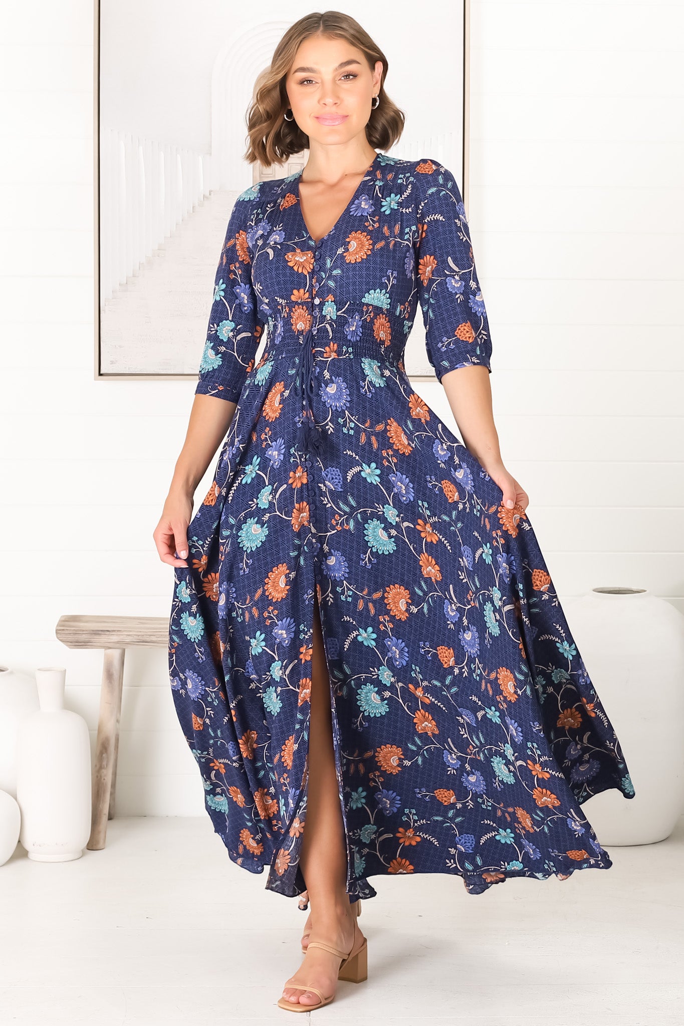 JAASE - Indiana Maxi Dress: Lace Back Shirred Waist A Line Dress with Handkercheif Hemline in Reeves Print