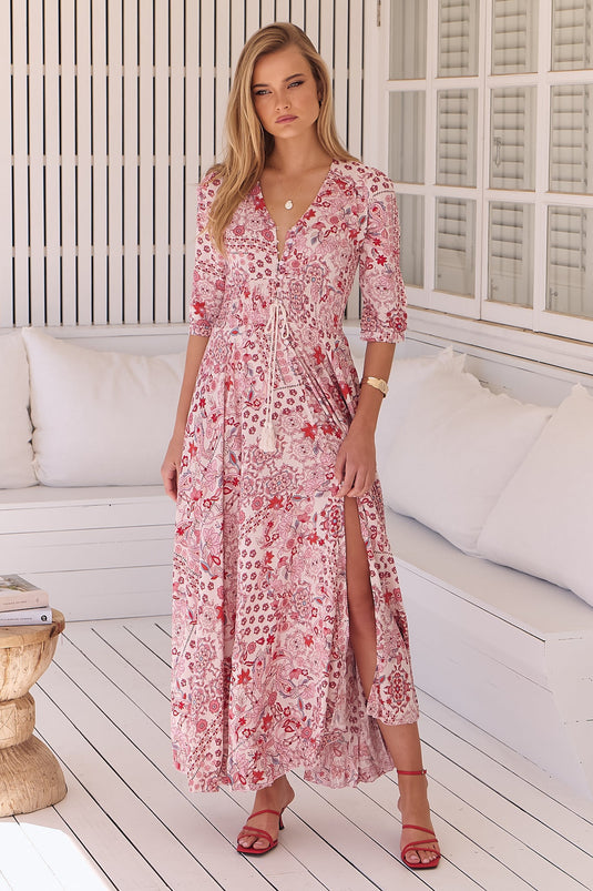 JAASE - Indiana Maxi Dress: Lace Back Shirred Waist A Line Dress with Handkercheif Hemline in Ruby Red Print