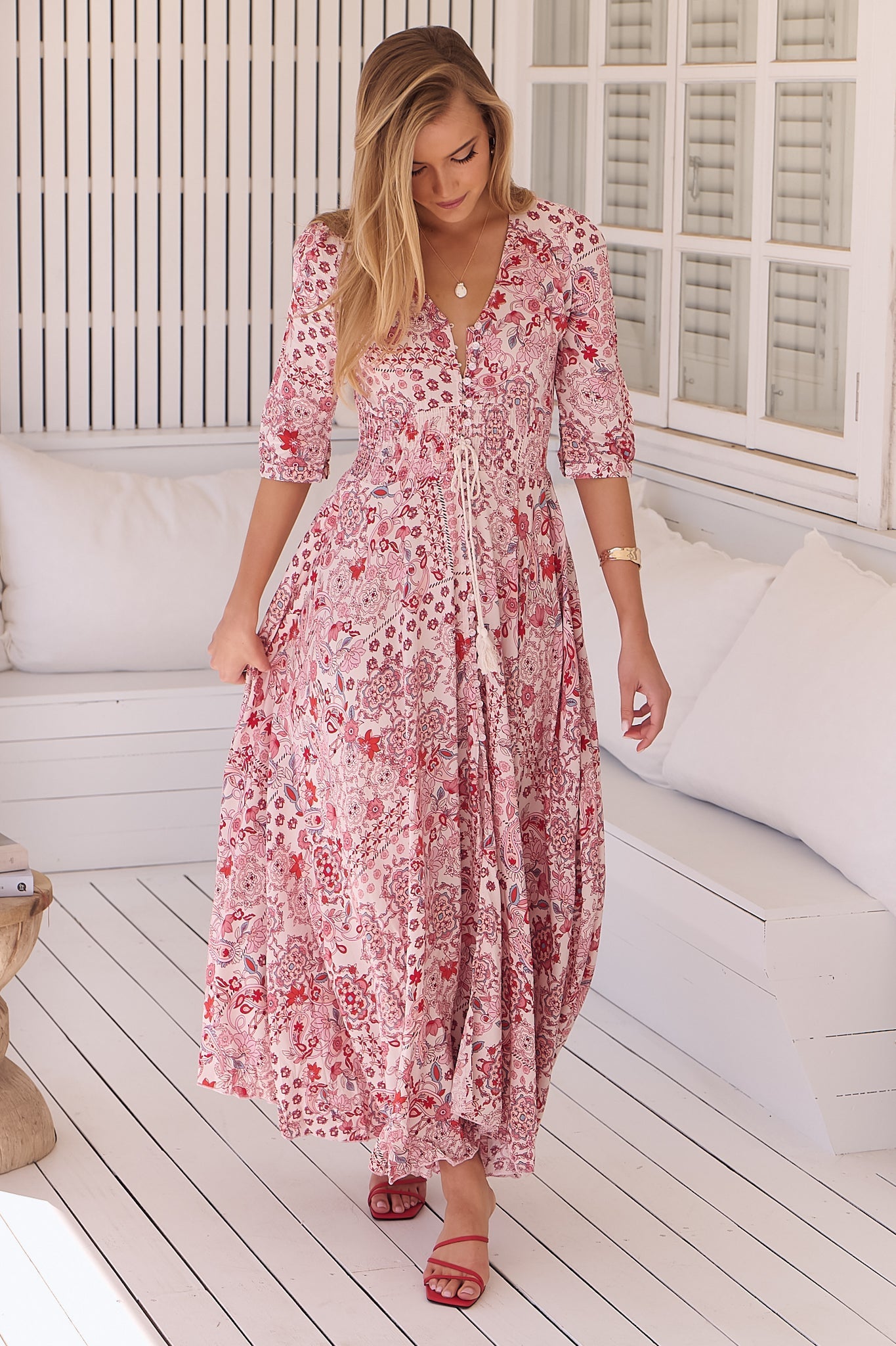 JAASE - Indiana Maxi Dress: Lace Back Shirred Waist A Line Dress with Handkercheif Hemline in Ruby Red Print