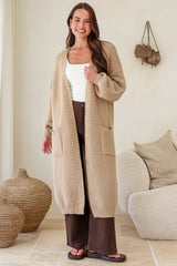 Model wearing Jacky Cardigan in Beige from Salty Crush