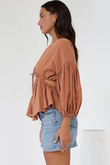Jacobson Top - Peplum Top with Side Cut Outs and Voluminous Sleeves in Tan