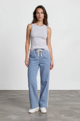 Model wearing Jakoda Jeans in Light Denim from Salty Crush