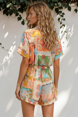 Model wearing Jarah Playsuit in Iluka Print from Salty Crush