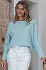 Model wearing Joanne Knit Top in Blue from Salty Crush