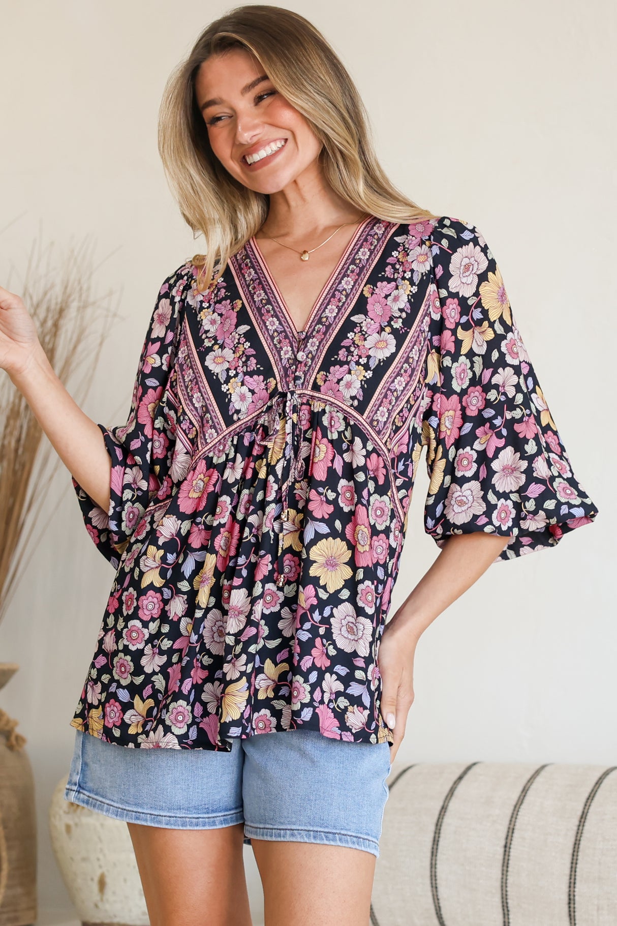 Model wearing Joelle Top in Anissa Print Black from Salty Crush