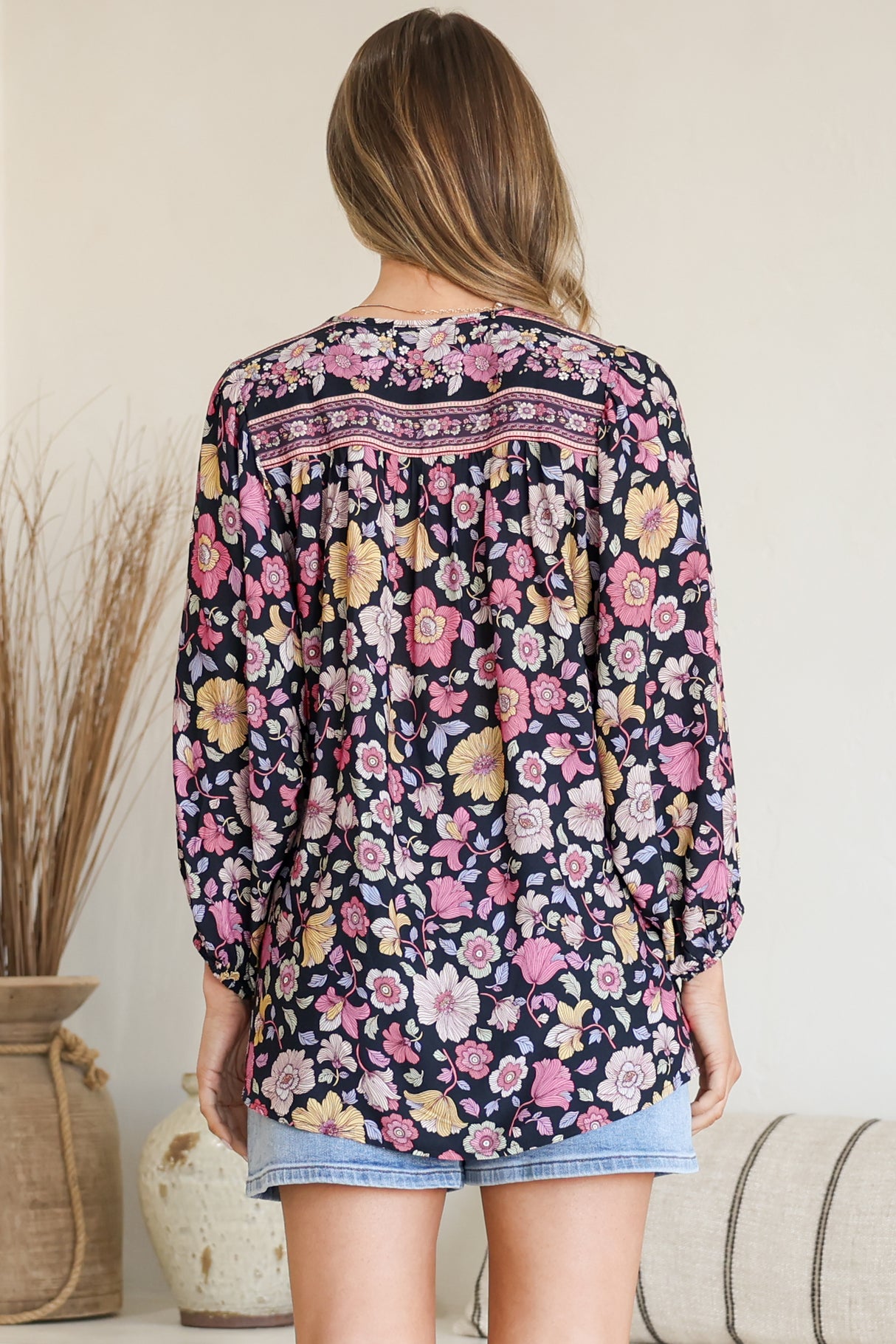 Model wearing Joelle Top in Anissa Print Black from Salty Crush