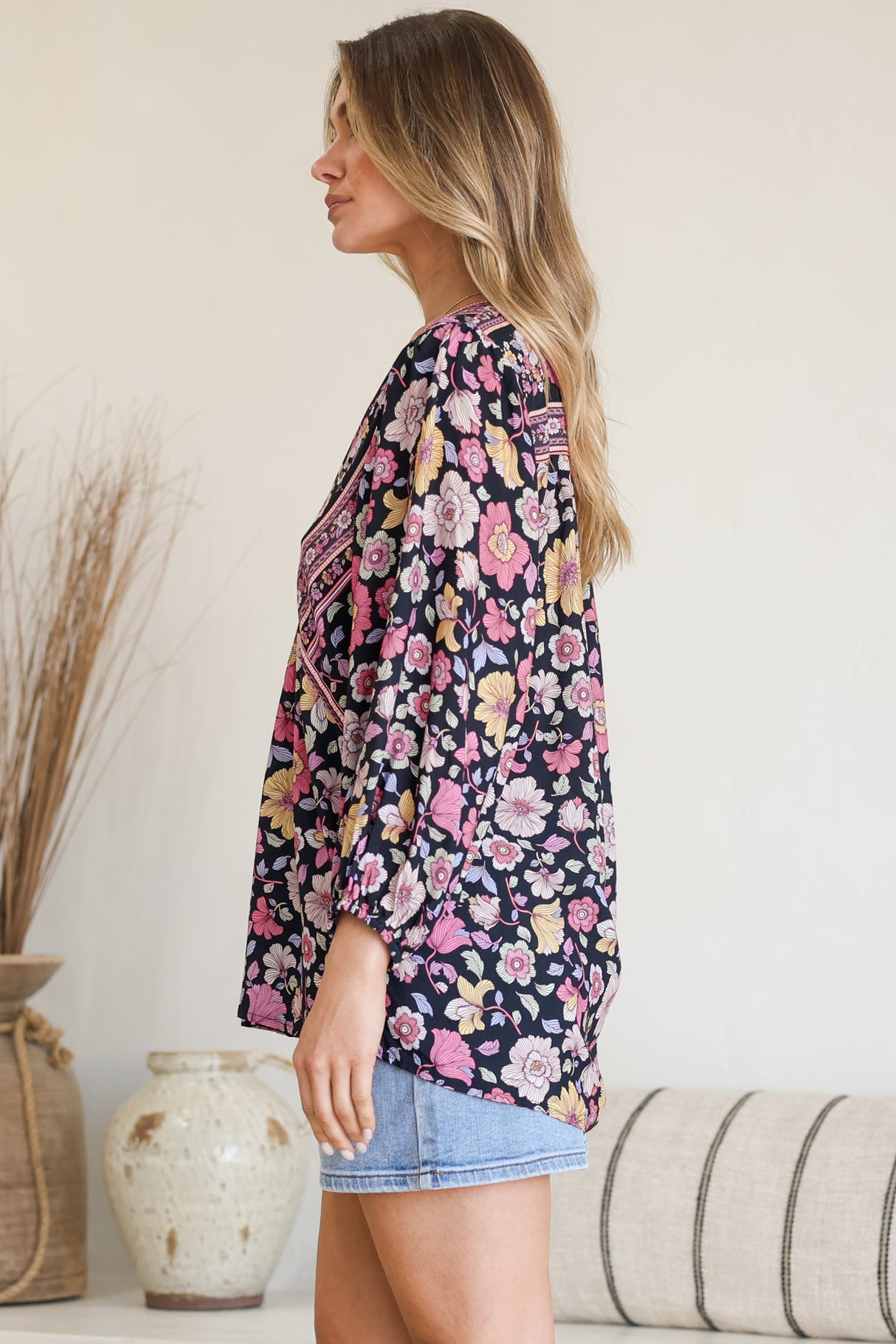 Model wearing Joelle Top in Anissa Print Black from Salty Crush
