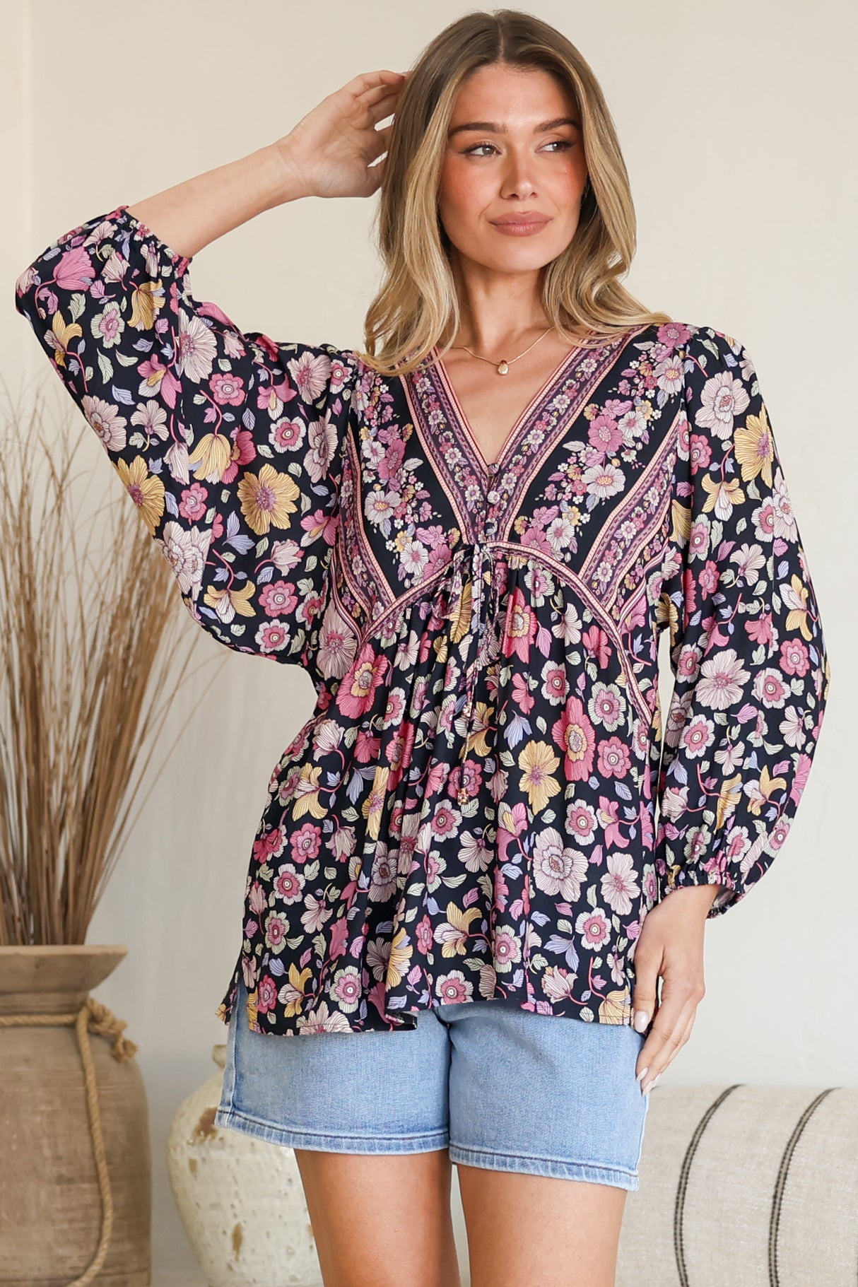 Model wearing Joelle Top in Anissa Print Black from Salty Crush