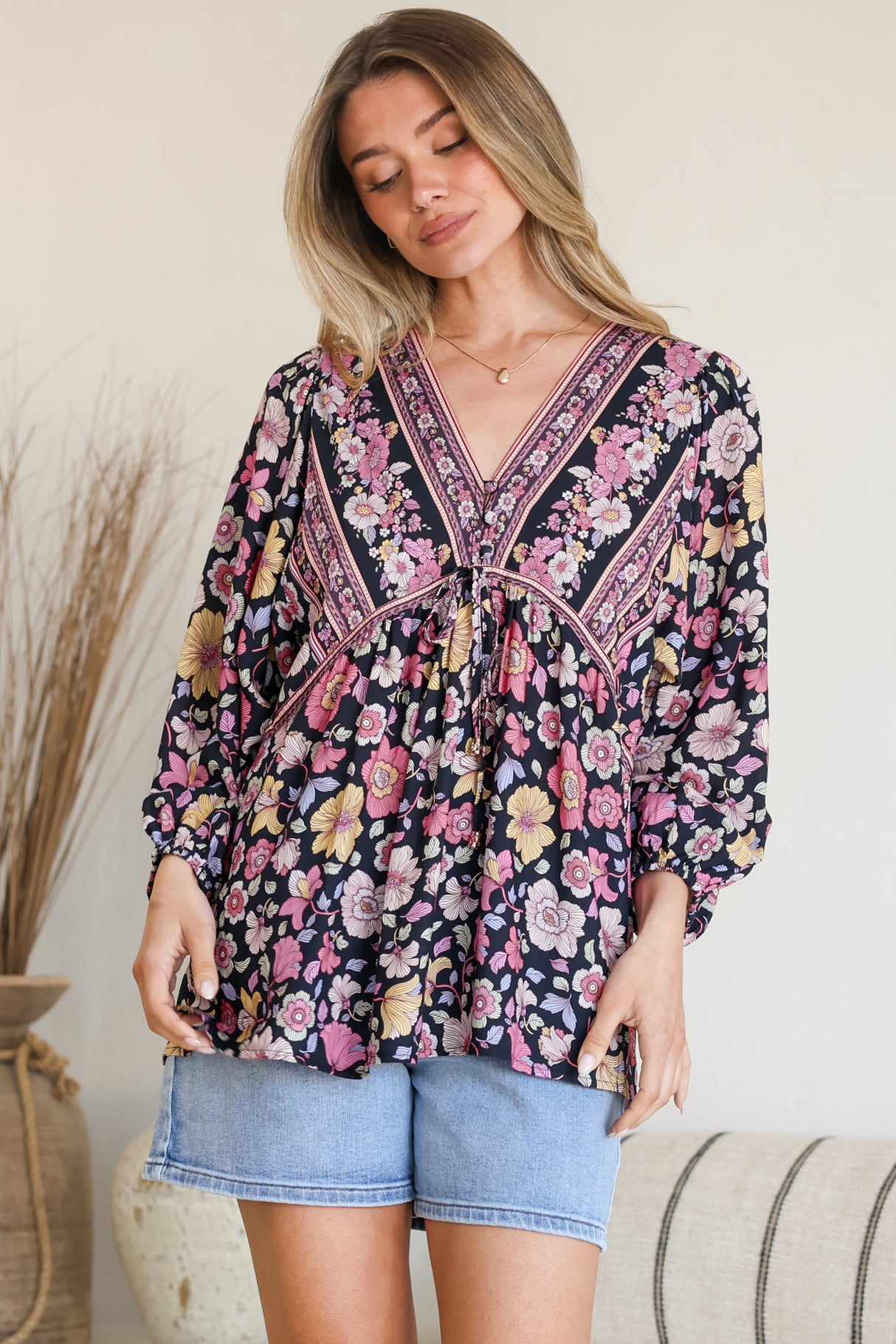 Model wearing Joelle Top in Anissa Print Black from Salty Crush