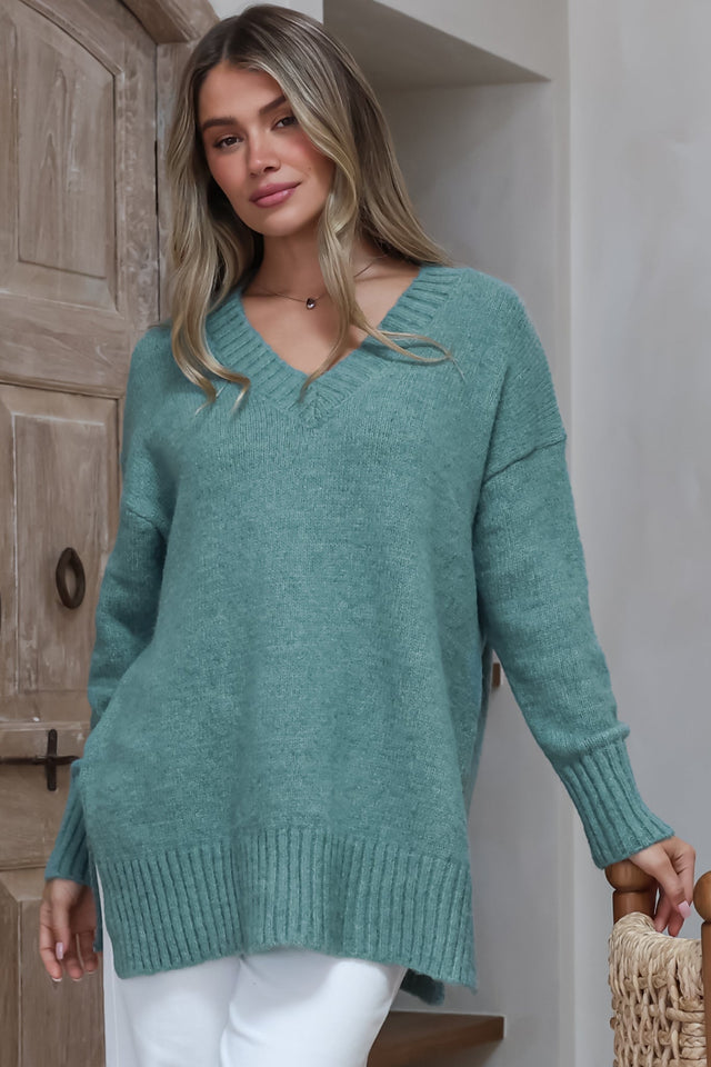 Model wearing Jonas Jumper in Teal from Salty Crush