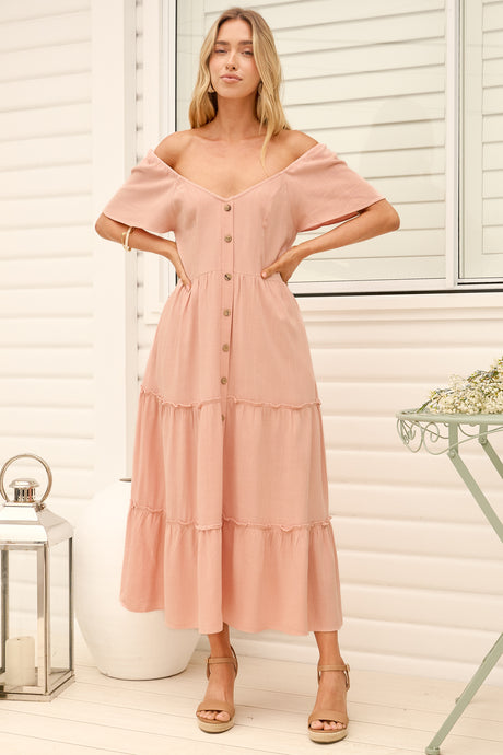 Model wearing Karina Midi Dress in Pink from Salty Crush