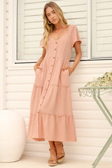 Model wearing Karina Midi Dress in Pink from Salty Crush