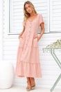 Model wearing Karina Midi Dress in Pink from Salty Crush