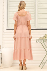 Model wearing Karina Midi Dress in Pink from Salty Crush