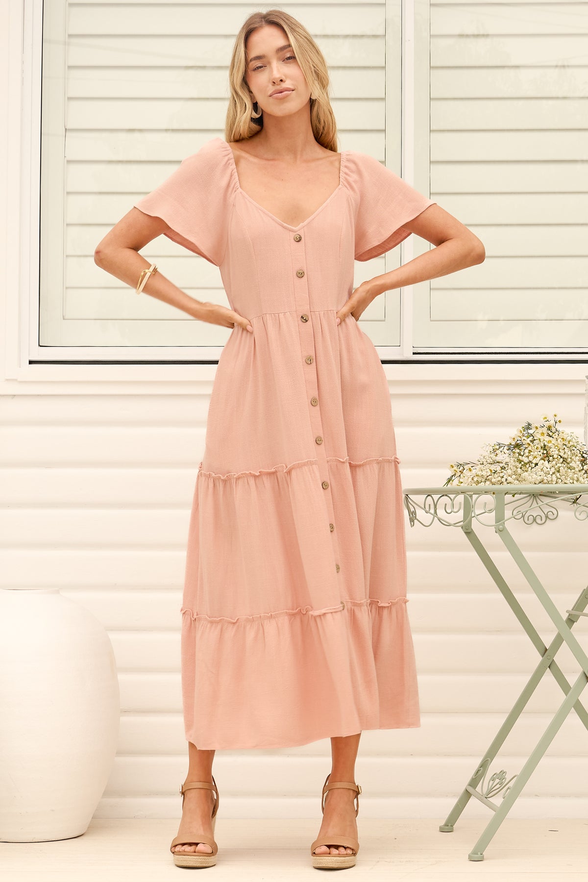 Model wearing Karina Midi Dress in Pink from Salty Crush