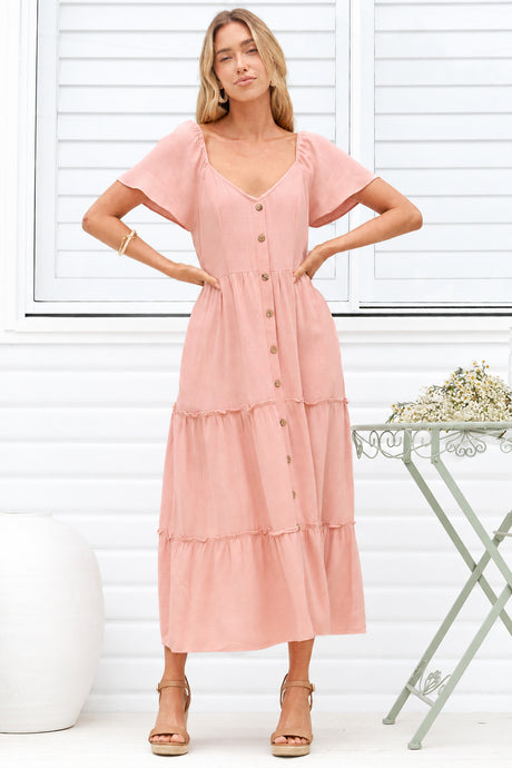 Model wearing Karina Midi Dress in Pink from Salty Crush