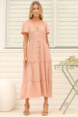 Model wearing Karina Midi Dress in Pink from Salty Crush