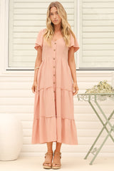 Model wearing Karina Midi Dress in Pink from Salty Crush