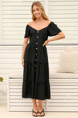 Model wearing Karina Midi Dress in Black from Salty Crush