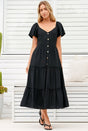 Model wearing Karina Midi Dress in Black from Salty Crush