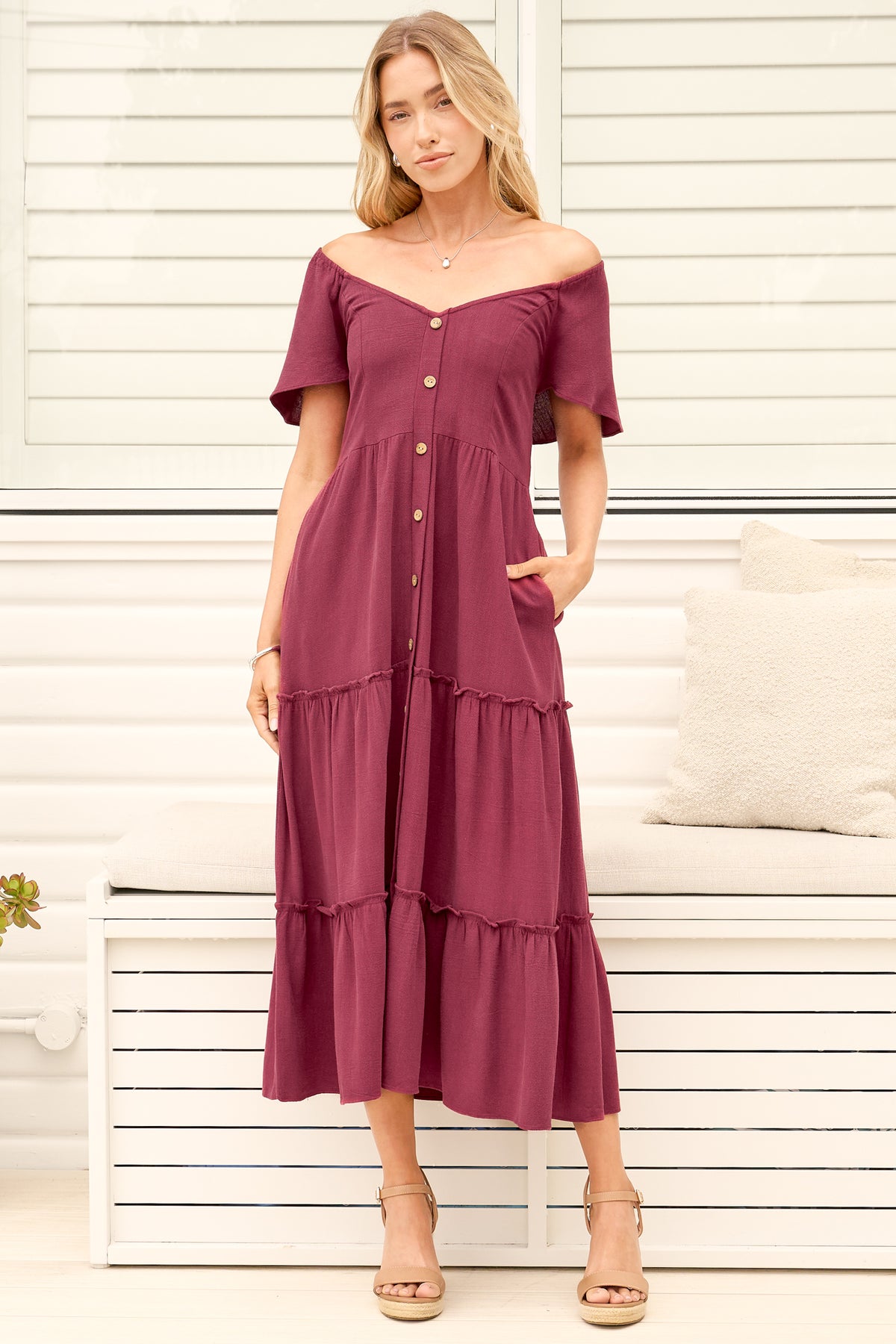 Model wearing Karina Midi Dress in Wine from Salty Crush