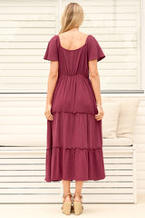 Model wearing Karina Midi Dress in Wine from Salty Crush