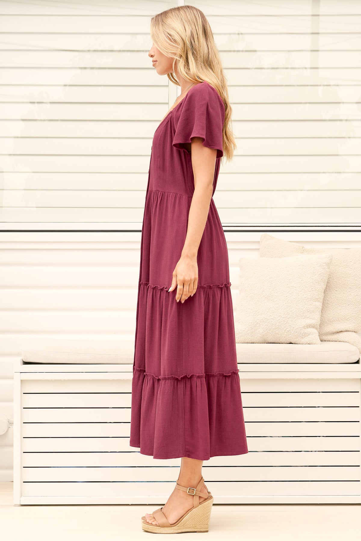 Model wearing Karina Midi Dress in Wine from Salty Crush