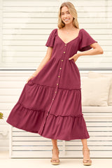 Model wearing Karina Midi Dress in Wine from Salty Crush
