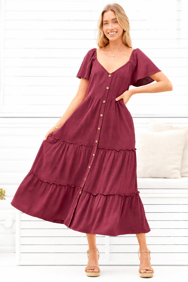 Model wearing Karina Midi Dress in Wine from Salty Crush