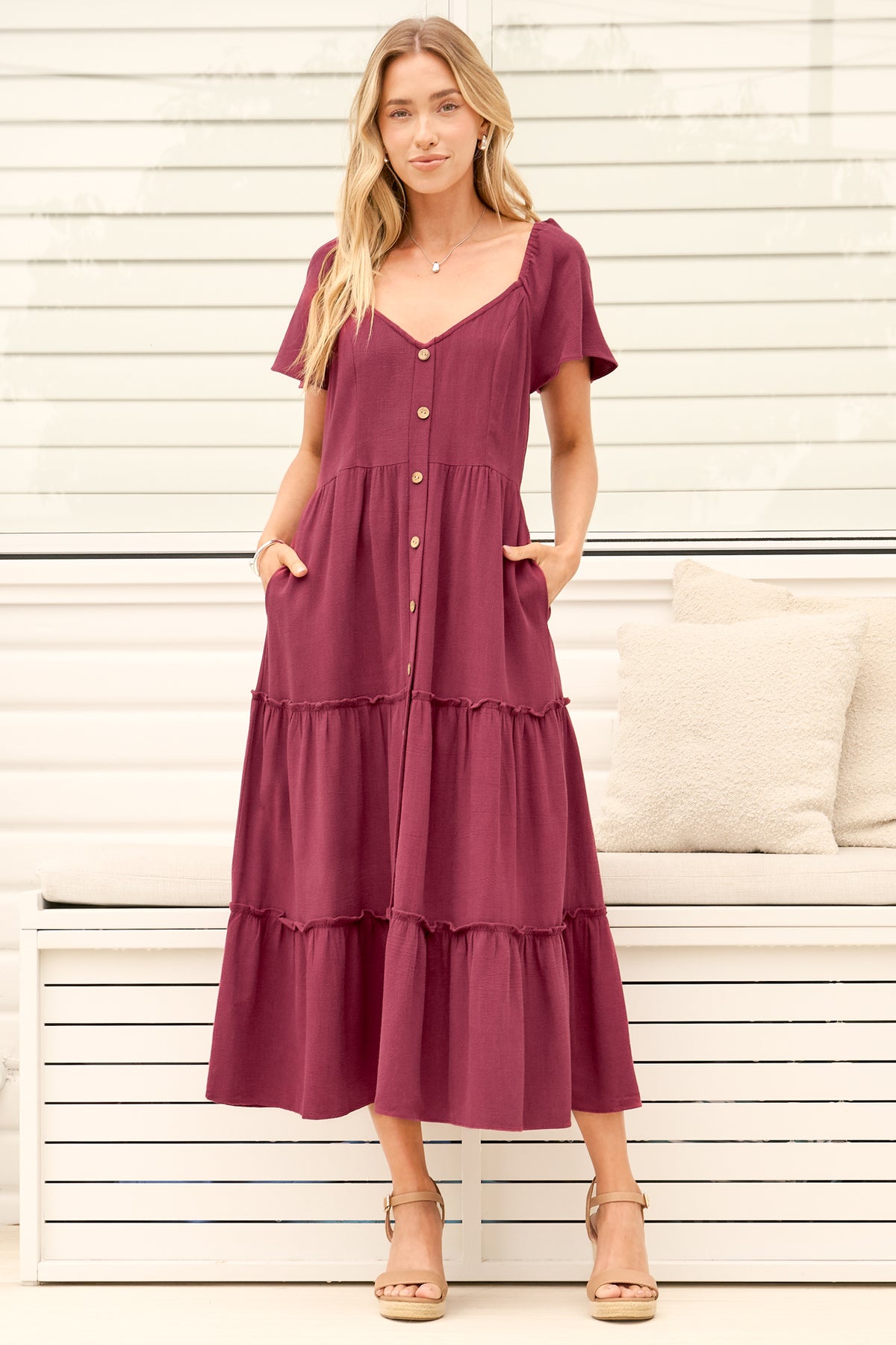 Model wearing Karina Midi Dress in Wine from Salty Crush
