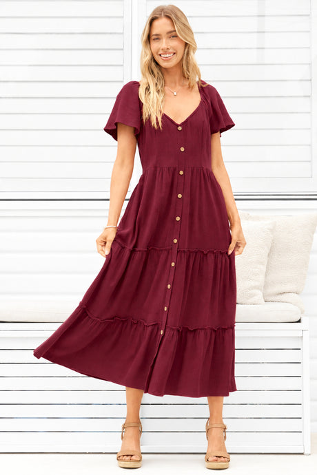 Model wearing Karina Midi Dress in Wine from Salty Crush