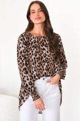 Model wearing Kayt Blouse in Leopard Print from Salty Crush