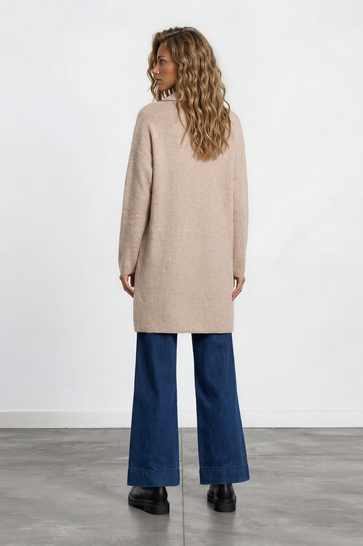Model wearing Keagan Cardigan in Camel from Salty Crush