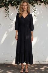 Model wearing Kiaba Maxi Dress in Black from Salty Crush